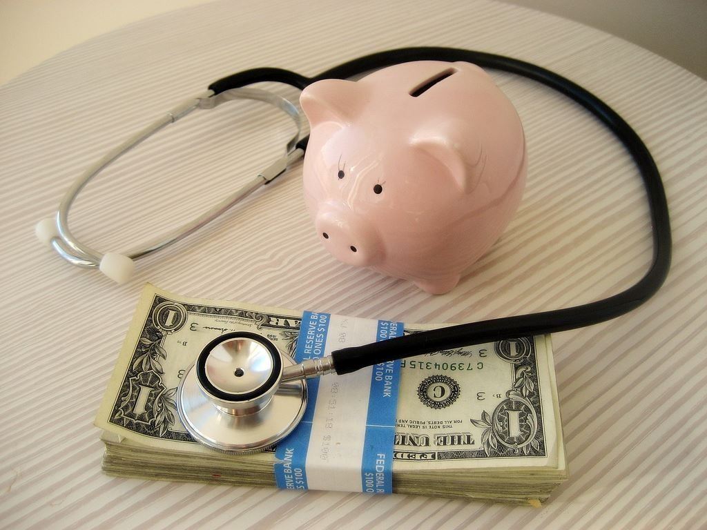 Image of medical devices and money