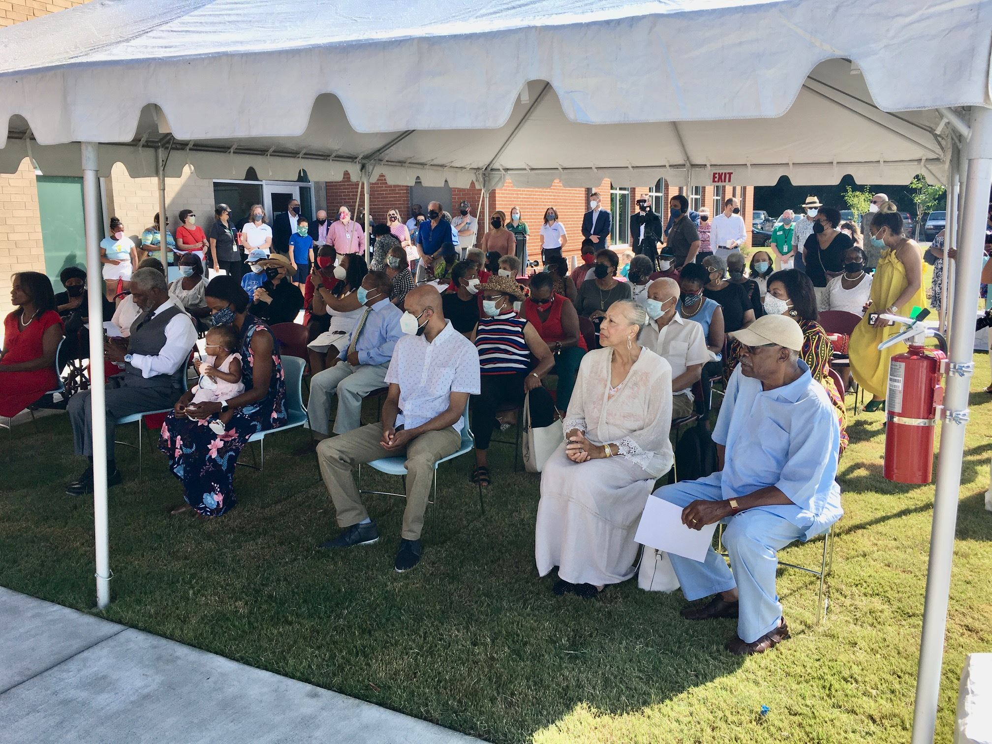 Crowd shot from ribbon cutting.