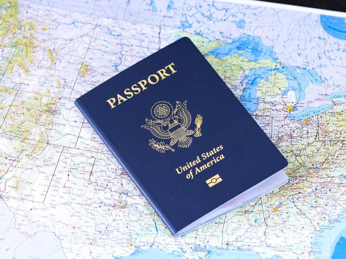 Photo of passport and map