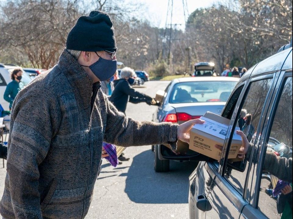 Photo of community distribution of LED bulbs