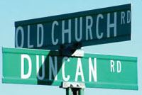 Street sign for Old Church Road and Duncan Road intersection