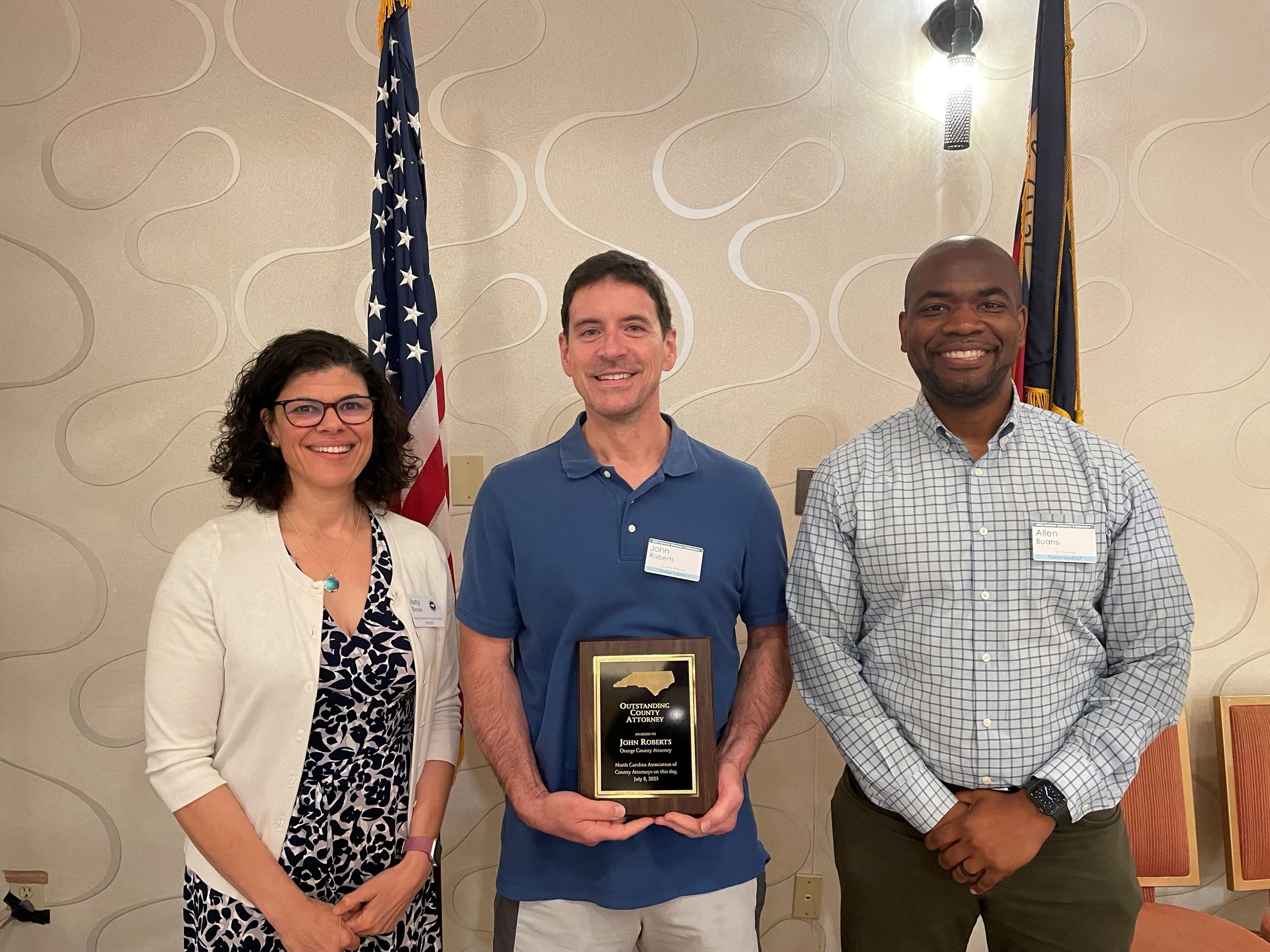 Photo of John Roberts, Amy Bason and Rep. Allen Buansi