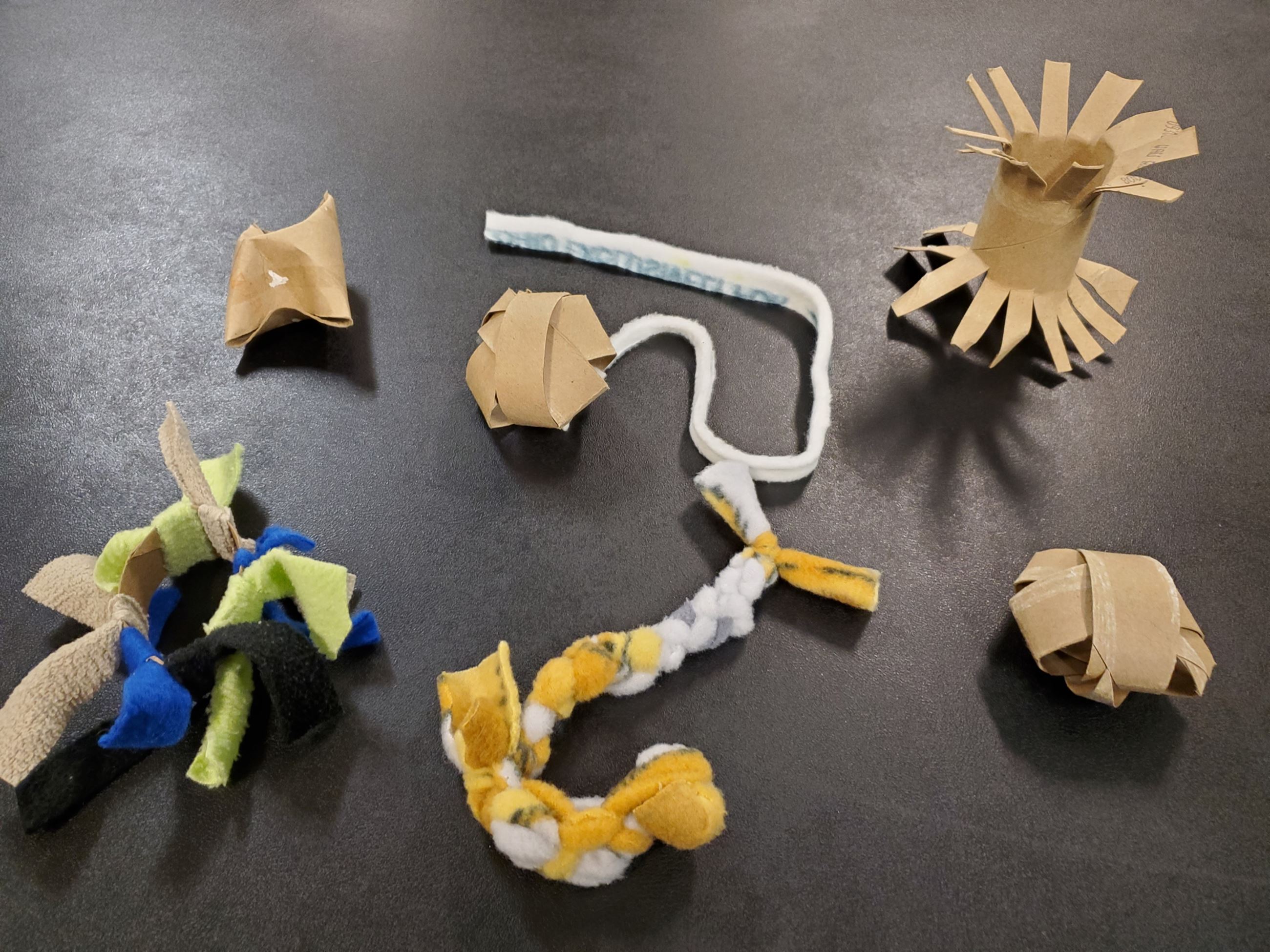 A photo of small, homemade cat toys