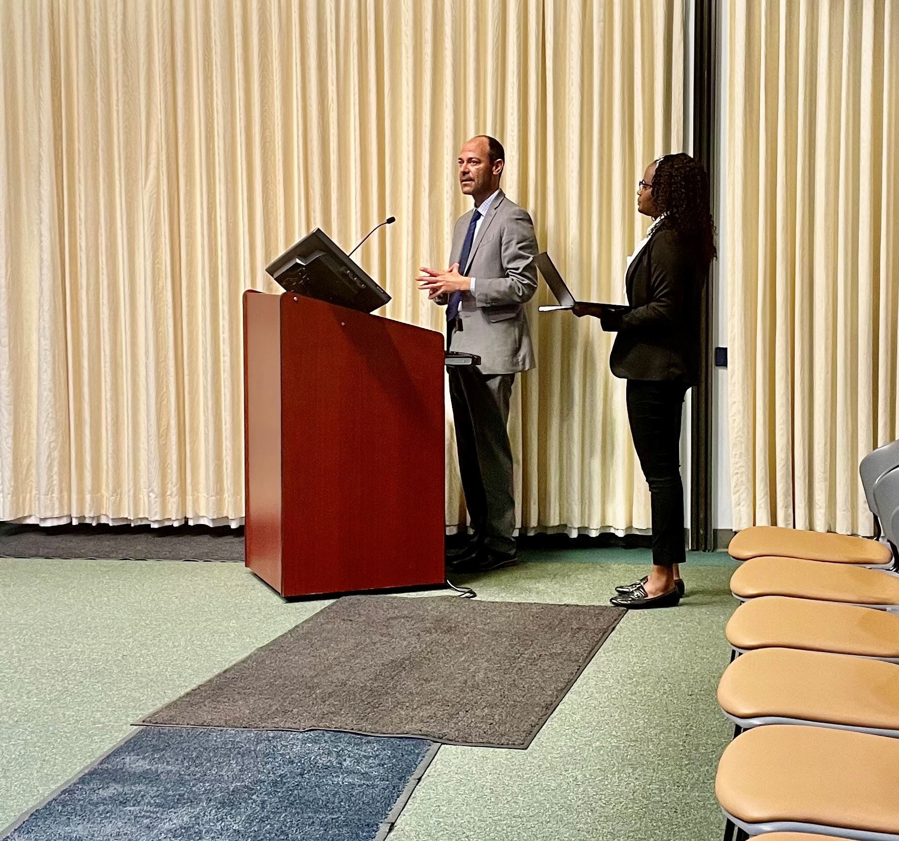 Photo of Travis Myren and Charline Kirongozi