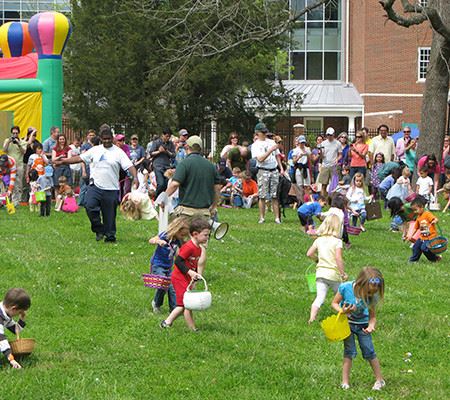 Small children outside during Easter egg hunt