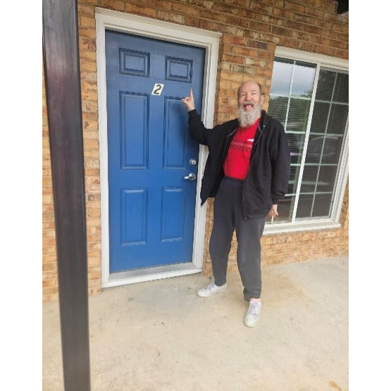 Mark, LRC participant, holding a key to his new appartment